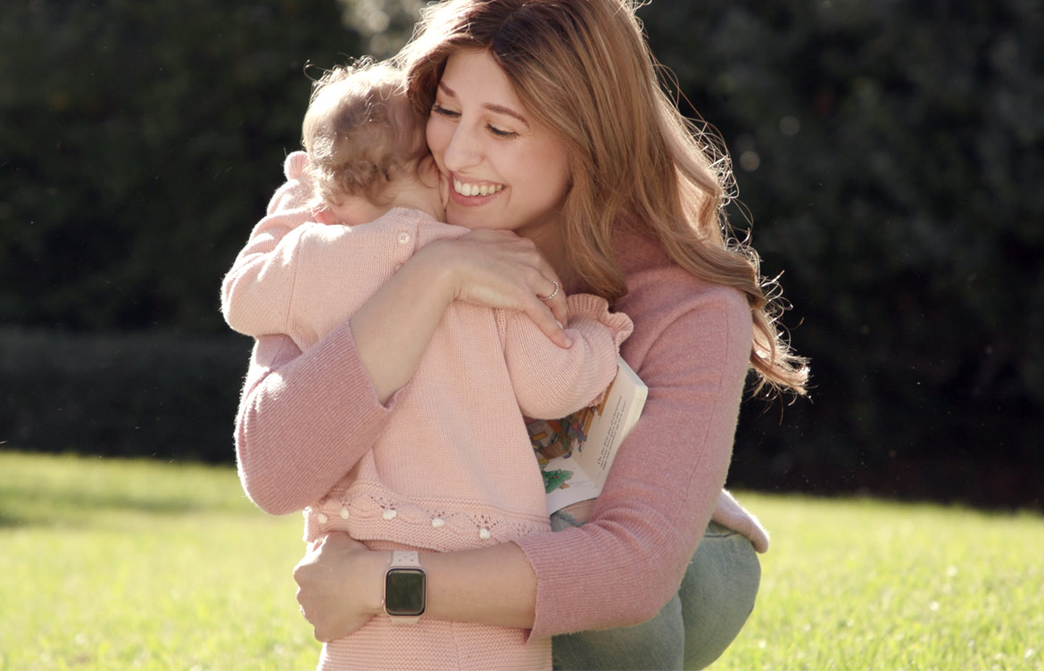 Ashley-hugging-baby