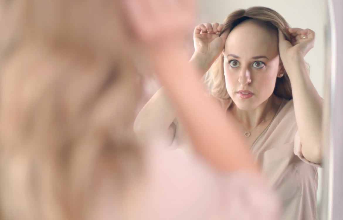 Ashley-taking-wig-off