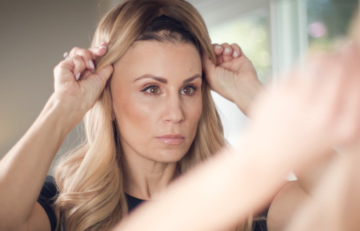 Mirna-removing-wig-by-ear-tabs